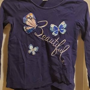 Girls navy blue long sleeve shirt.